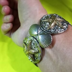 Two tone silvertone goldtone crystal starfish shells stretch bracelet